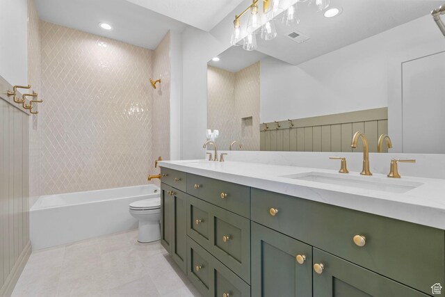 full bathroom featuring  shower combination, double vanity, visible vents, and a sink