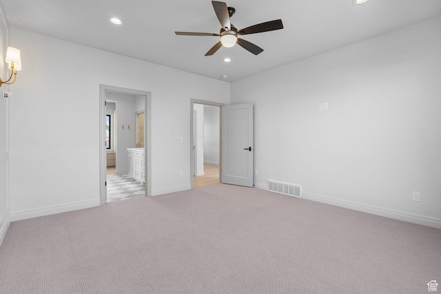unfurnished bedroom with recessed lighting, visible vents, and light carpet