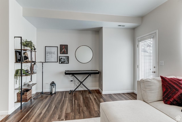 1424 W Stone Meadow Dr, West Jordan, UT 84088 - living area with dark wood-type flooring, visible vents, and baseboards