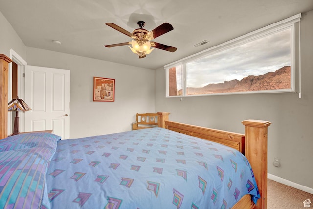1657 N Kayenta Dr, Ivins, UT 84738 - bedroom with carpet, a ceiling fan, and baseboards