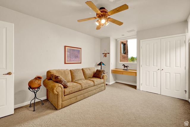 1657 N Kayenta Dr, Ivins, UT 84738 - carpeted living room featuring baseboards and ceiling fan