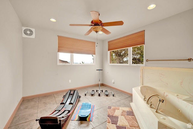 1657 N Kayenta Dr, Ivins, UT 84738 - bathroom with healthy amount of natural light, a tub with jets, ceiling fan, tile patterned floors, and recessed lighting