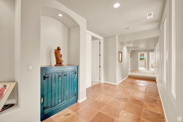1657 N Kayenta Dr, Ivins, UT 84738 - hallway with recessed lighting, baseboards, and light stone finish flooring