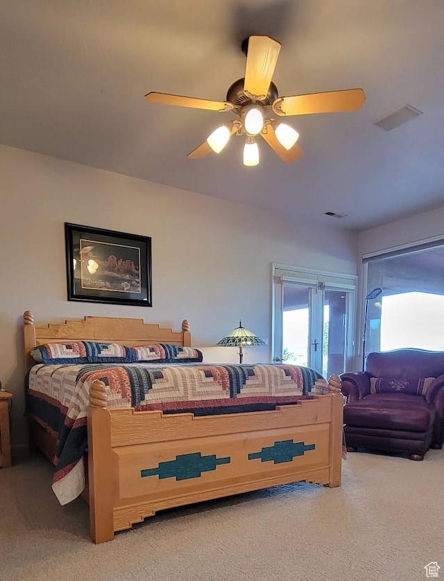 1657 N Kayenta Dr, Ivins, UT 84738 - bedroom featuring carpet flooring, a ceiling fan, and access to exterior