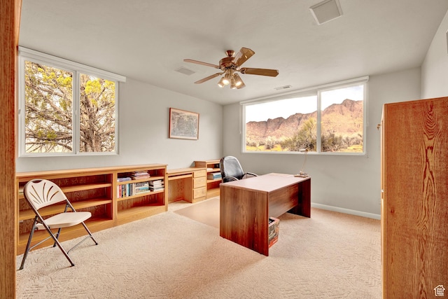 1657 N Kayenta Dr, Ivins, UT 84738 - carpeted office space with a mountain view, ceiling fan, and baseboards