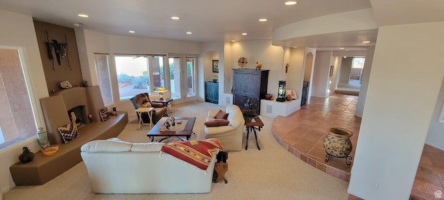 1657 N Kayenta Dr, Ivins, UT 84738 - living area with a fireplace with raised hearth, arched walkways, and recessed lighting