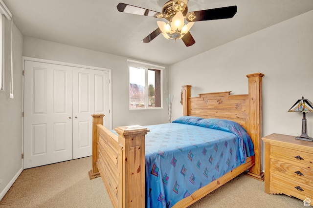 1657 N Kayenta Dr, Ivins, UT 84738 - bedroom with light colored carpet, a closet, a ceiling fan, and baseboards