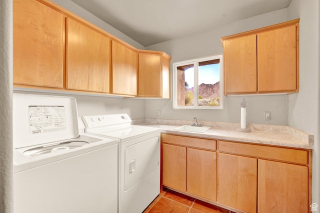 1657 N Kayenta Dr, Ivins, UT 84738 - laundry area with cabinet space, washing machine and dryer, and light tile patterned floors