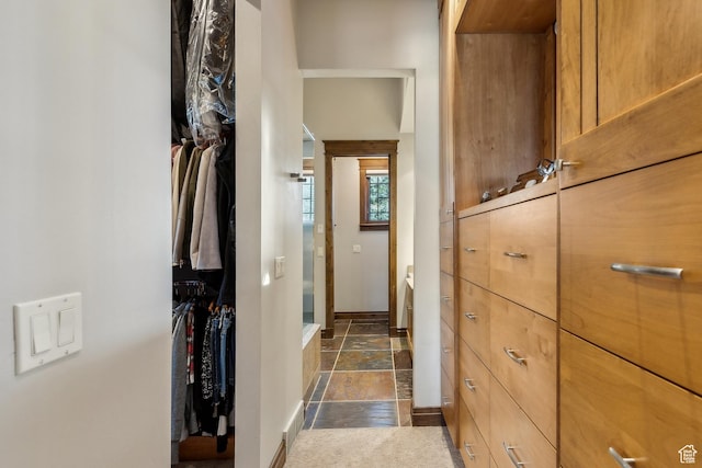 9255 Par Ct, Park City, UT 84098 - hallway featuring baseboards and stone tile floors
