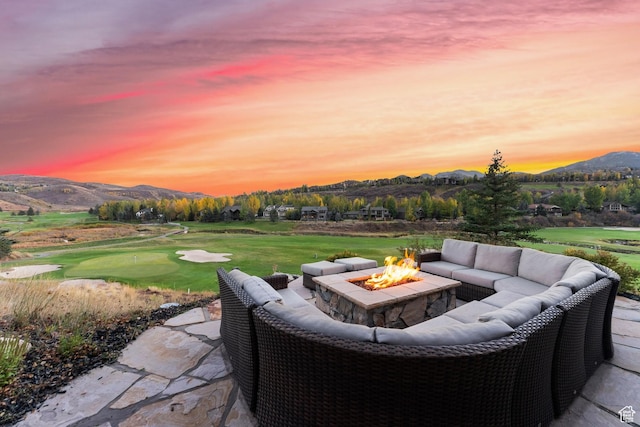 9255 Par Ct, Park City, UT 84098 - patio terrace at dusk with a mountain view, a fire pit, and golf course view
