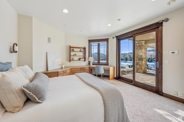 9255 Par Ct, Park City, UT 84098 - bedroom with baseboards, light colored carpet, built in desk, recessed lighting, and access to outside