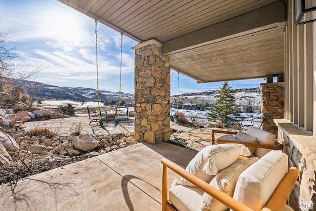 9255 Par Ct, Park City, UT 84098 - snow covered patio featuring an outdoor living space and a mountain view