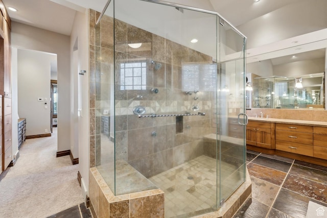 9255 Par Ct, Park City, UT 84098 - full bathroom with stone tile flooring, baseboards, a stall shower, and vanity