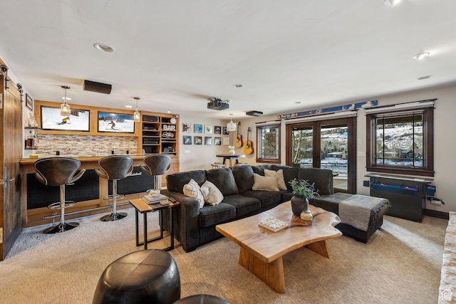 9255 Par Ct, Park City, UT 84098 - living room with a barn door and light carpet