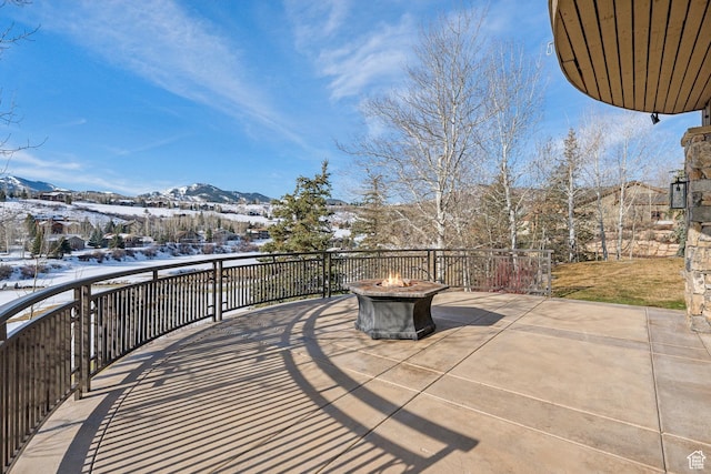 9255 Par Ct, Park City, UT 84098 - snow covered patio with a mountain view and an outdoor fire pit