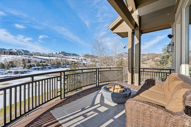 9255 Par Ct, Park City, UT 84098 - snow covered back of property with a mountain view and a fire pit