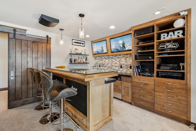 9255 Par Ct, Park City, UT 84098 - bar featuring light carpet, tasteful backsplash, a barn door, and a bar