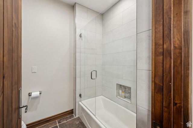 9255 Par Ct, Park City, UT 84098 - full bathroom with baseboards, bath / shower combo with glass door, and toilet