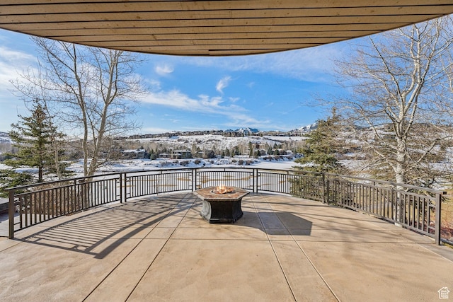 9255 Par Ct, Park City, UT 84098 - snow covered patio with an outdoor fire pit