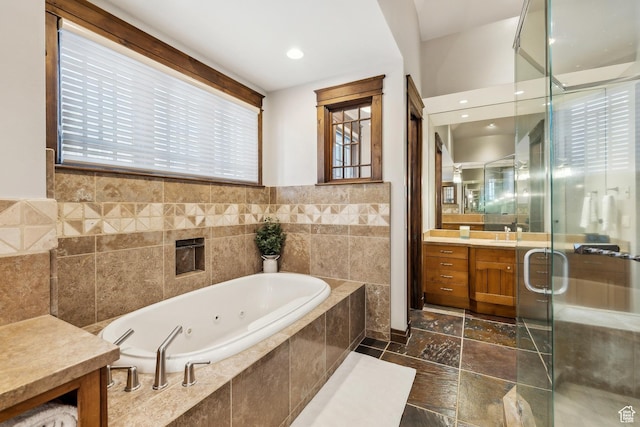 9255 Par Ct, Park City, UT 84098 - full bathroom with vanity, a shower stall, and a tub with jets