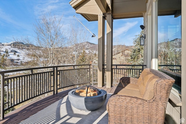 9255 Par Ct, Park City, UT 84098 - wooden terrace featuring a mountain view and an outdoor fire pit