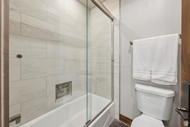 9255 Par Ct, Park City, UT 84098 - bathroom featuring toilet and bath / shower combo with glass door