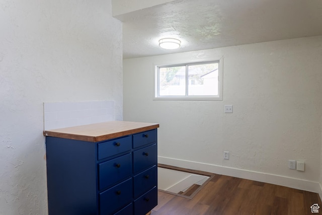 735 Castle Gate Rd, Helper, UT 84526 - bedroom with a textured wall, a textured ceiling, baseboards, and wood finished floors