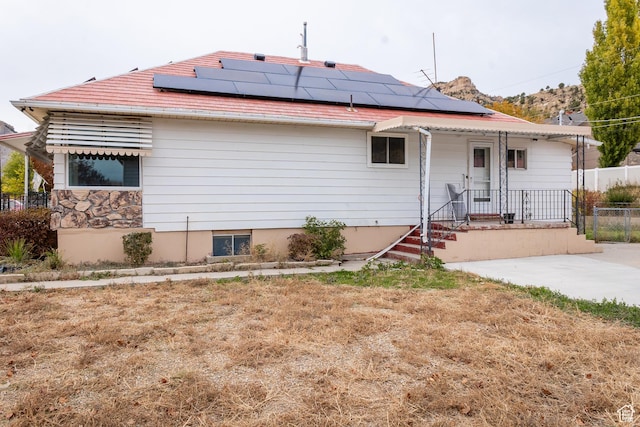735 Castle Gate Rd, Helper, UT 84526 - back of house with solar panels and fence