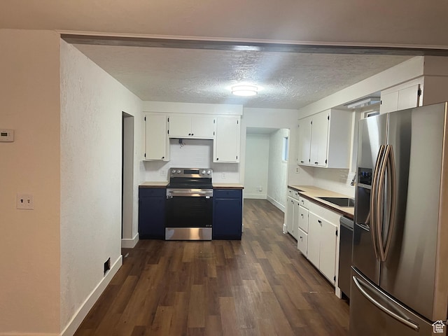 735 Castle Gate Rd, Helper, UT 84526 - kitchen featuring dark wood-style floors, appliances with stainless steel finishes, white cabinets, and a textured ceiling
