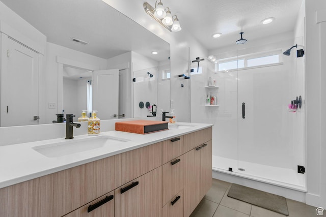 134 N Eden Brook Way, Saratoga Springs, UT 84045 - bathroom with double vanity, a stall shower, visible vents, and a sink