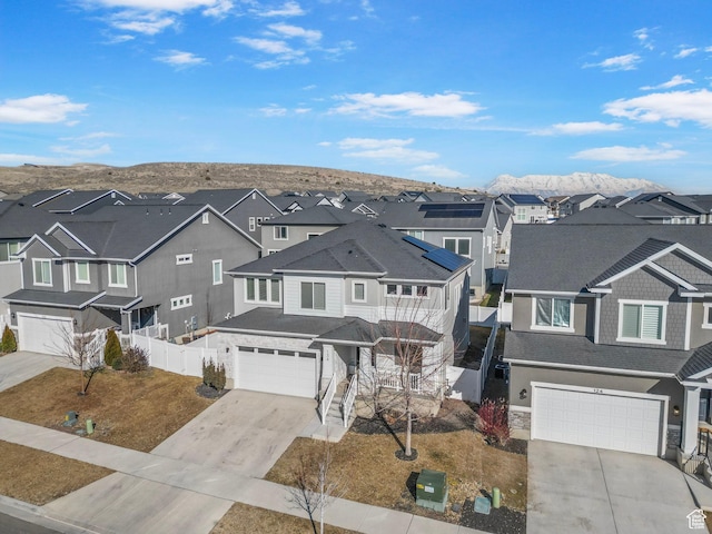 134 N Eden Brook Way, Saratoga Springs, UT 84045 - view of front of property with a residential view, a mountain view, driveway, and fence
