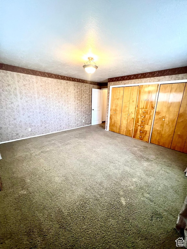305 N 200 E, Elsinore, UT 84724 - unfurnished bedroom with wallpapered walls and carpet