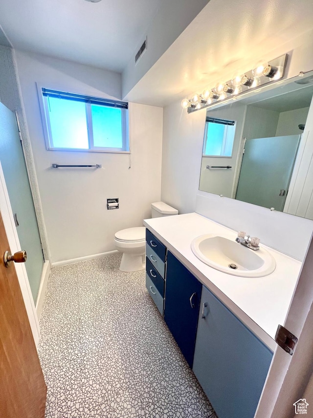 305 N 200 E, Elsinore, UT 84724 - full bathroom with visible vents, toilet, a shower stall, vanity, and baseboards