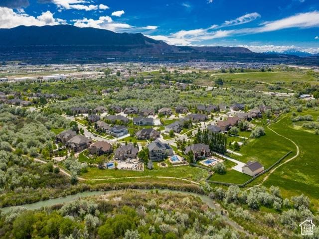 990 W Adams Cir, Bluffdale, UT 84065 - drone / aerial view with a residential view and a mountain view