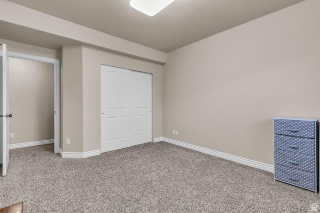 990 W Adams Cir, Bluffdale, UT 84065 - unfurnished bedroom featuring a closet, carpet flooring, and baseboards