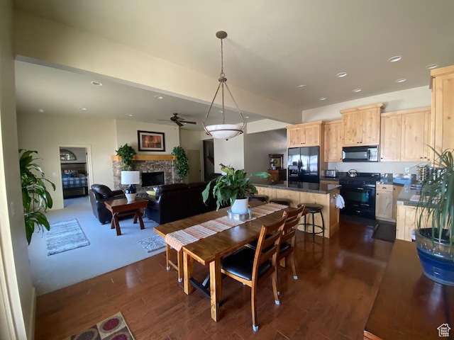 3435 Big Piney Dr, Eden, UT 84310 - dining area featuring dark wood-style floors, a fireplace, and recessed lighting