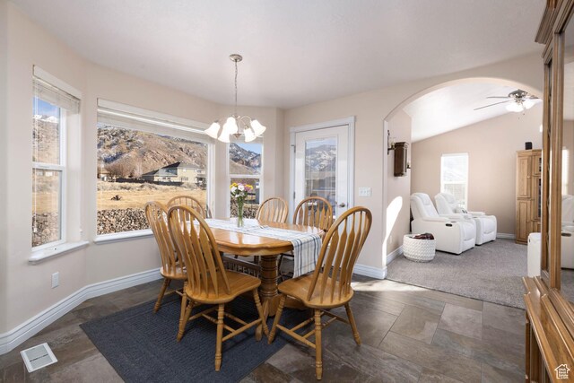 315 S 300 E, Monroe, UT 84754 - dining space with plenty of natural light, arched walkways, a ceiling fan, and a chandelier