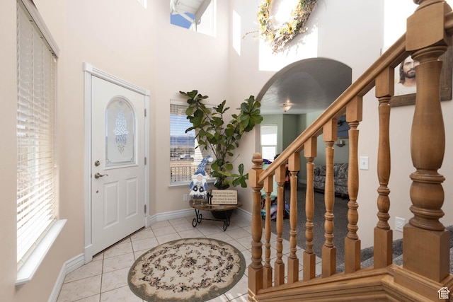 315 S 300 E, Monroe, UT 84754 - tiled entrance foyer featuring stairs, baseboards, a chandelier, and a towering ceiling