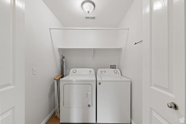 187 N Stone Mountain Dr, St George, UT 84770 - laundry room with washing machine and clothes dryer and baseboards
