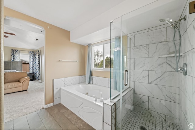 187 N Stone Mountain Dr, St George, UT 84770 - bathroom featuring connected bathroom, a garden tub, a shower stall, ceiling fan, and baseboards