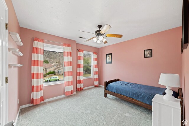 187 N Stone Mountain Dr, St George, UT 84770 - bedroom with carpet, baseboards, and a ceiling fan