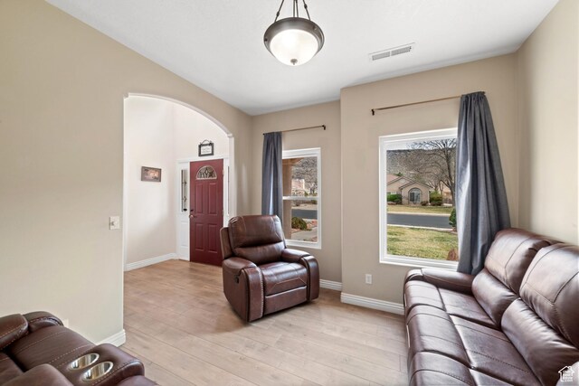 187 N Stone Mountain Dr, St George, UT 84770 - living room featuring light wood-type flooring and baseboards