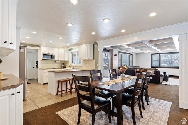 4884 E 2800 N, Eden, UT 84310 - dining area featuring recessed lighting, light tile patterned flooring, a textured ceiling, coffered ceiling, and beamed ceiling