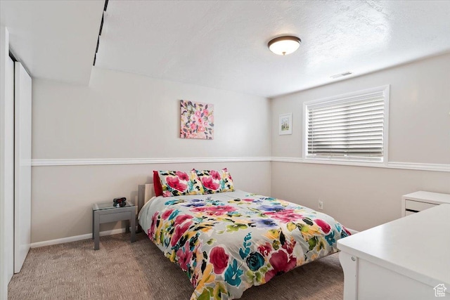 4884 E 2800 N, Eden, UT 84310 - bedroom featuring baseboards, visible vents, and light colored carpet