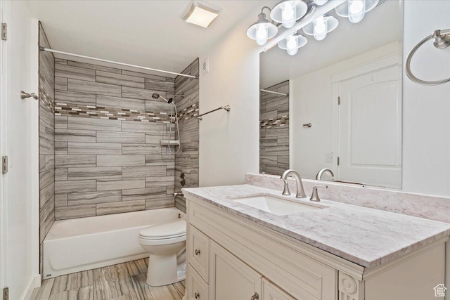 4884 E 2800 N, Eden, UT 84310 - full bathroom featuring toilet,  shower combination, wood finished floors, and vanity