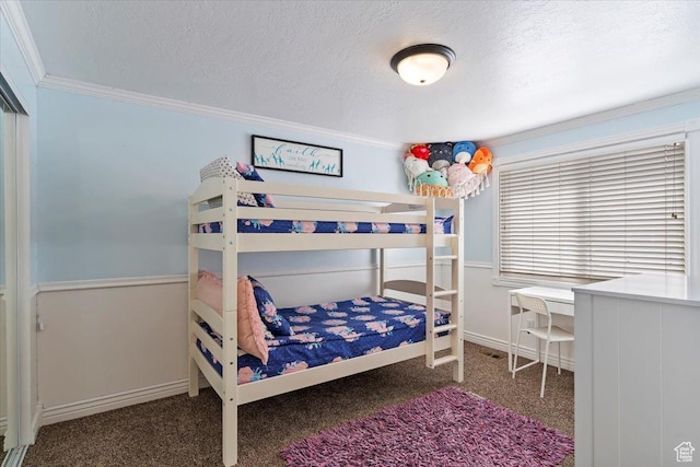 4884 E 2800 N, Eden, UT 84310 - carpeted bedroom with a textured ceiling, baseboards, and crown molding