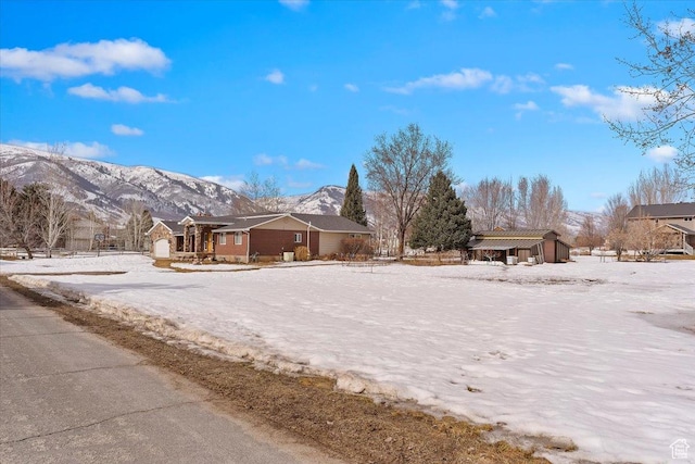 4884 E 2800 N, Eden, UT 84310 - yard covered in snow featuring a mountain view