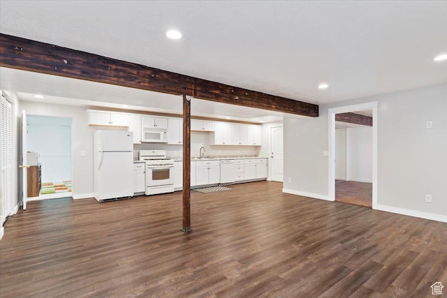 4884 E 2800 N, Eden, UT 84310 - unfurnished living room with dark wood-style floors, a sink, and baseboards