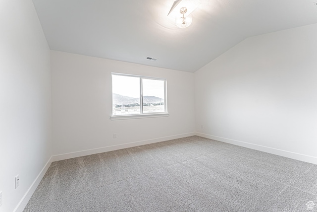 684 W 4500 S Unit 313, Mapleton, UT 84664 - carpeted spare room featuring lofted ceiling and baseboards