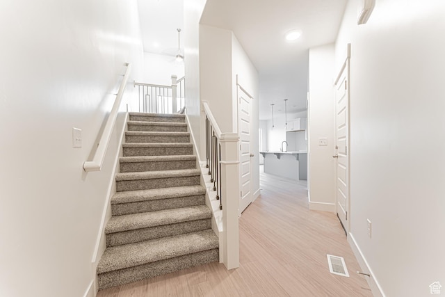 684 W 4500 S Unit 313, Mapleton, UT 84664 - stairs with ceiling fan, recessed lighting, and wood finished floors